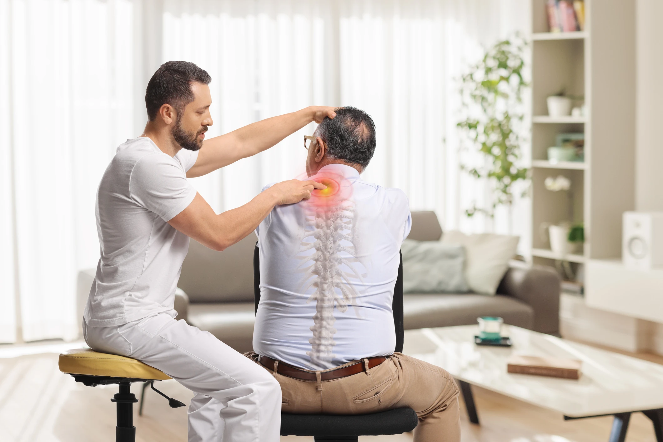 Man receiving neck and back massage therapy.